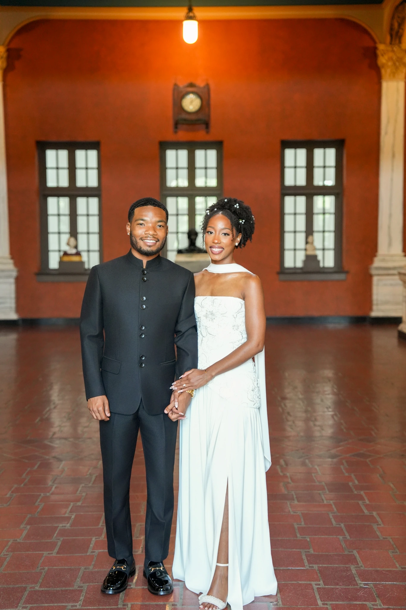 Engaged couple smiling together in an elegant Houston venue