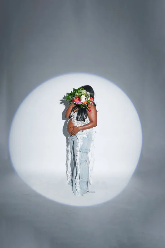 Fine-art maternity portrait with flowers